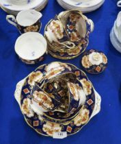 A Royal Albert Heirloom pattern teaset comprising six trios, milk jug, sugar bowl and teapot lid