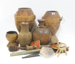 Two African wooden storage vessels, a shagreen covered knife, African woven water vessels etc