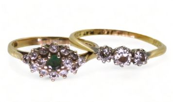 An 18ct gold and platinum three stone diamond ring set with estimated approx 0.25cts of brilliant