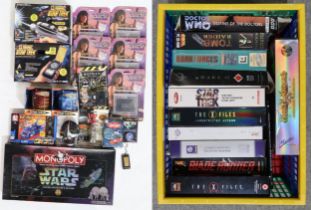 A selection of retro sci-fi PC games and assorted other collectables, including Star Wars