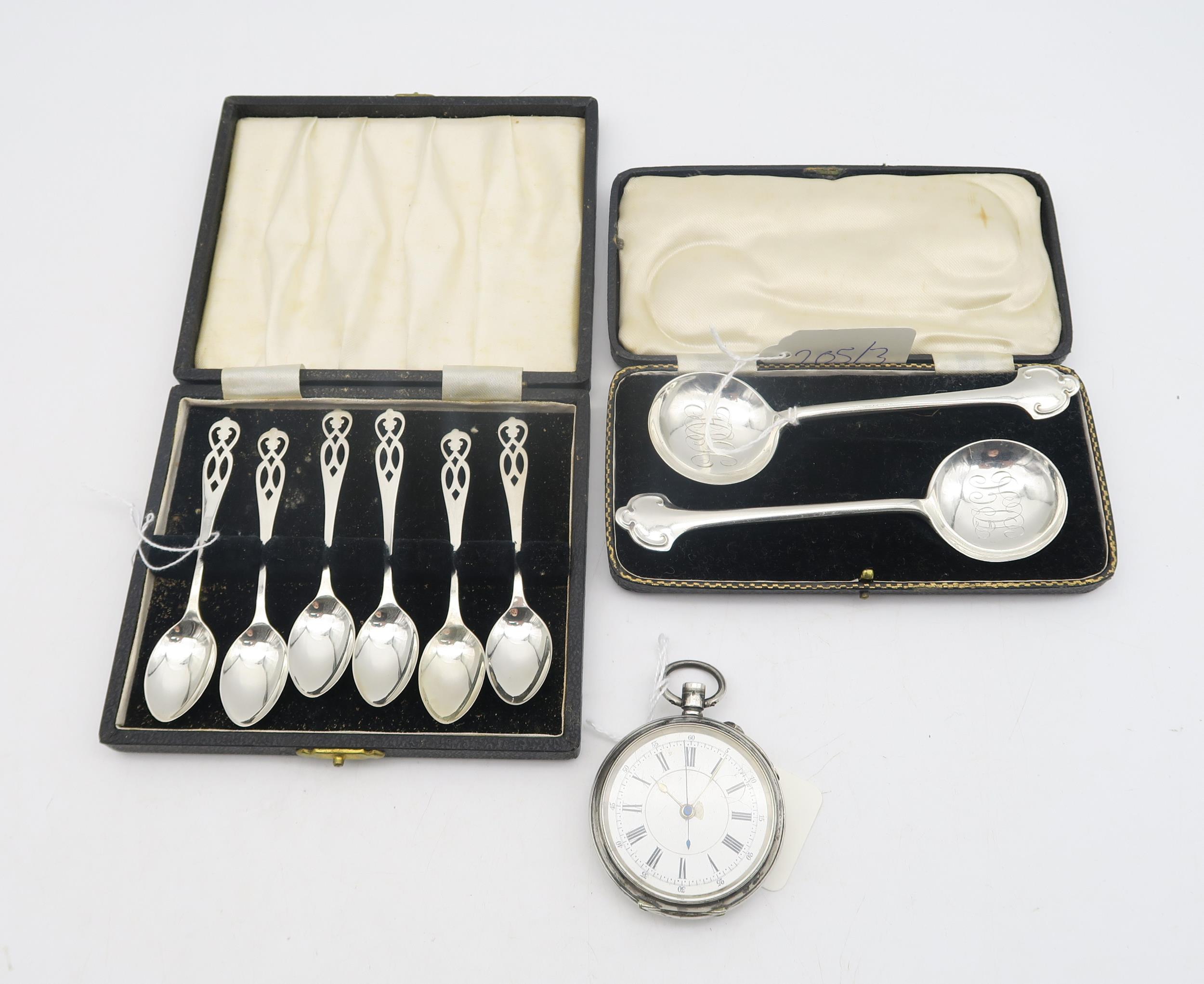 A cased pair of silver spoons, by Joseph Rodgers & Sons, Sheffield, with monogrammed bowls, a