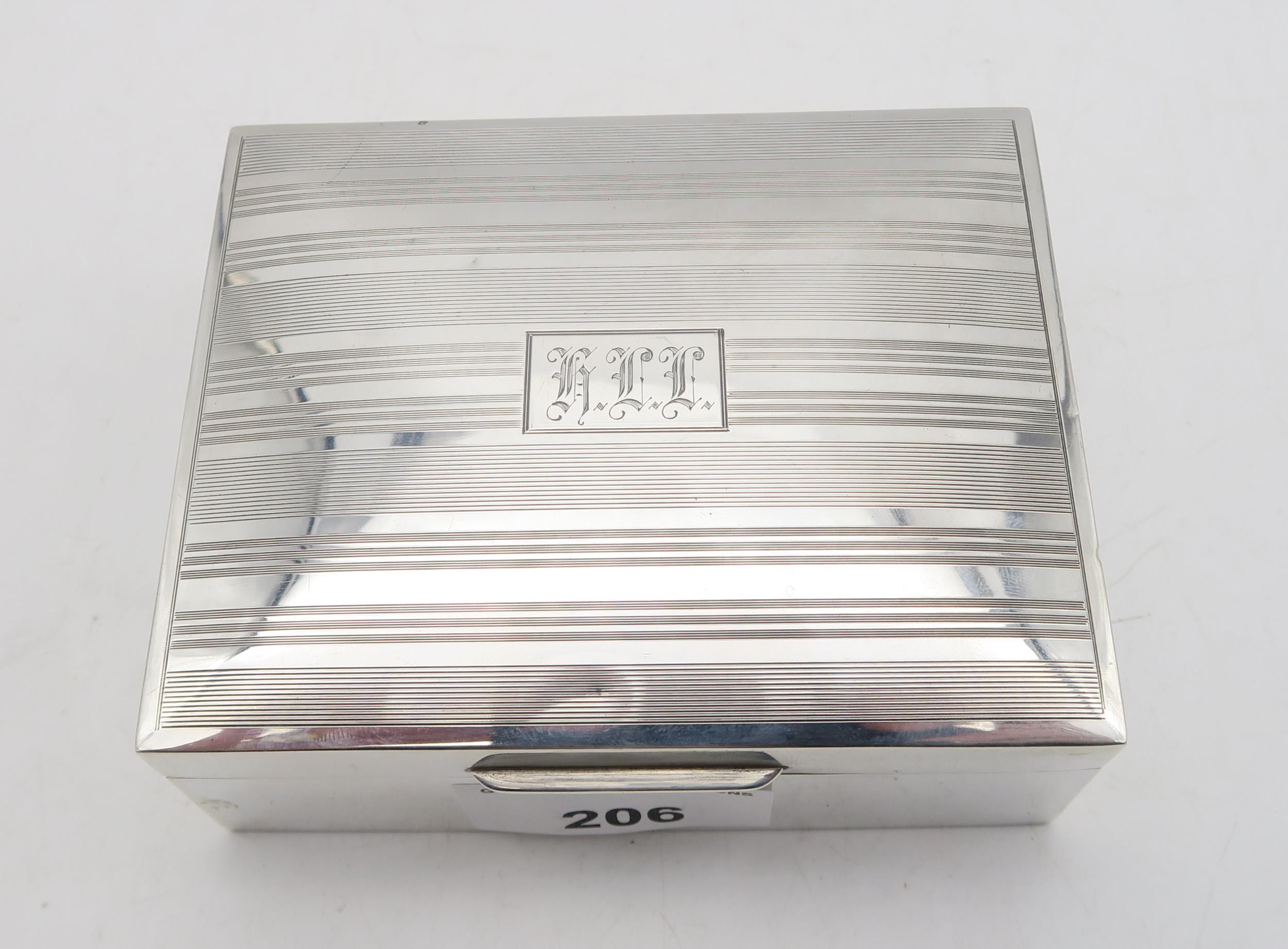 A Goerge V silver cigarette box, by William Hair Haseler, Birmingham 1933, the lid with engine- - Image 3 of 3