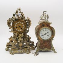Two French mantle clocks, one in gilt metal, the other with a painted and gilded wooden case
