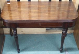 A Victorian mahogany fold over tea table with single drawer on turned supports, 71cm high x 107cm
