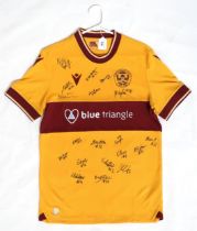 MOTHERWELL F.C. A 2023/24 Women's Home shirt, size M, bearing team signatures Proceeds to benefit