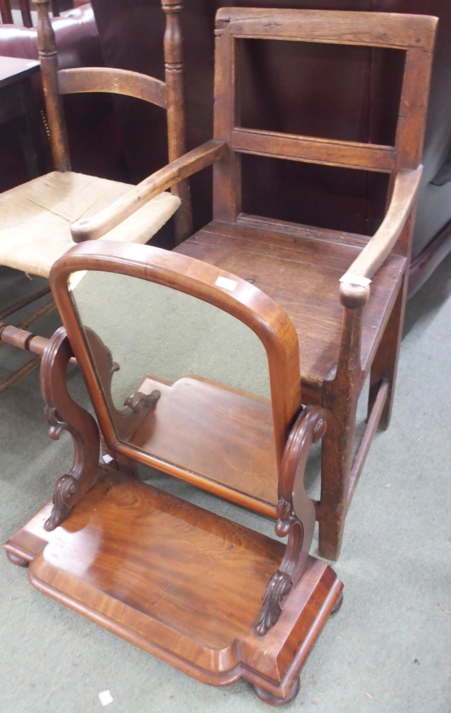 A 19th century elm open armchair and a mahogany dressing mirror (2) Condition Report:Available