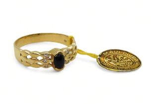 A 14k gold black coral and diamond ring, made by Maui Divers of Hawaii, finger size U1/2, weight 3.