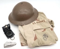 A WW2 British Brodie helmet, stamped "1941 EC & Co Ltd" to underside of brim, 1953-dated military-