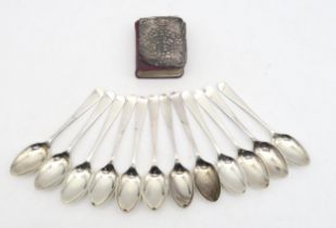 A set of silver teaspoons, by Cooper Brothers & Sons, Sheffield, and a silver-covered miniature