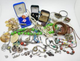 A collection of silver jewellery to include two Ward Brothers thistle brooches, a silver Norwegian
