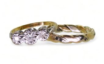 An 18ct gold ring set with three illusion set diamonds, with an approximate total of 0.30cts, finger