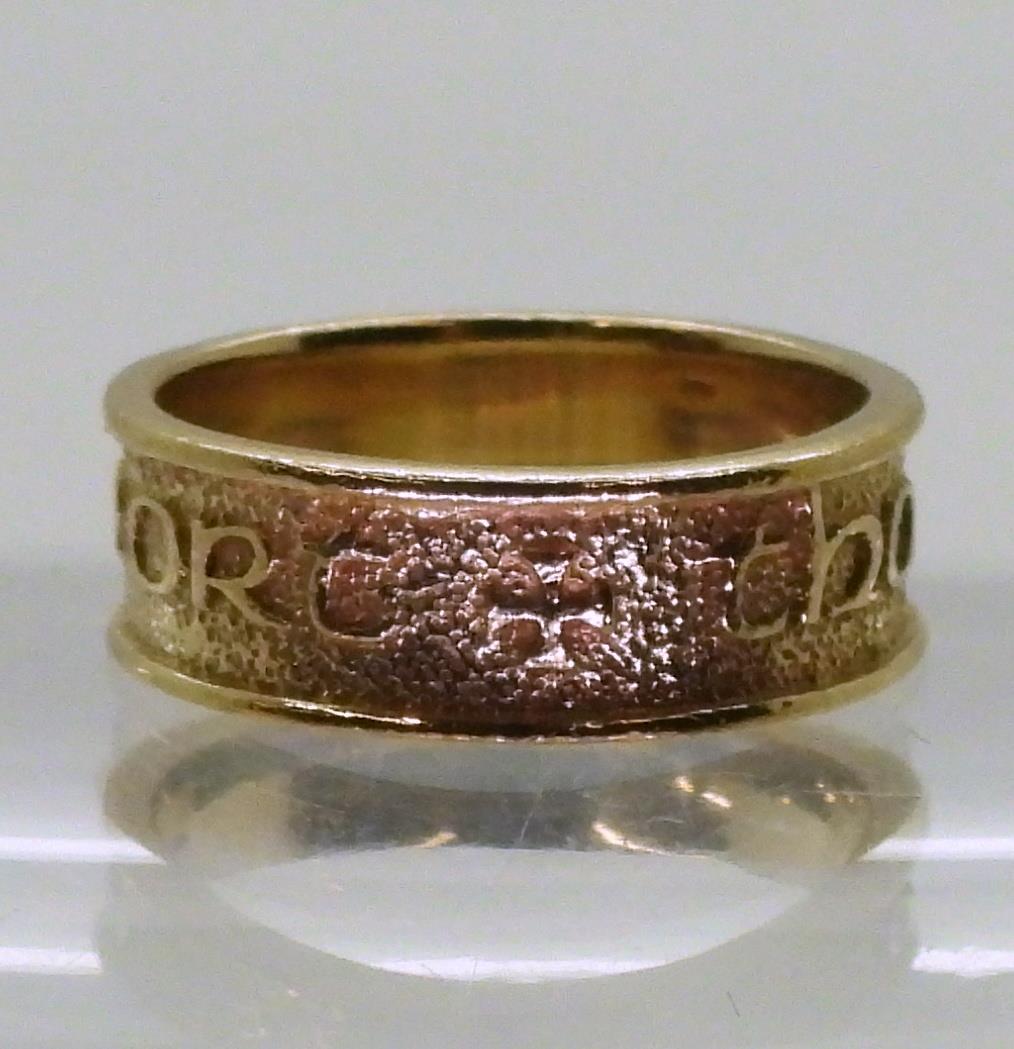 A 9ct gold ring with embossed Celtic phrase 'Tha gaol agam ort' - I Love you, made by Ola Gorie, - Image 2 of 3