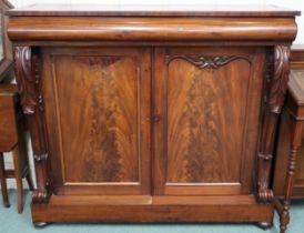 A Victorian mahogany two door chiffonier with frieze drawer on bun feet, 109cm high x 124cm wide x