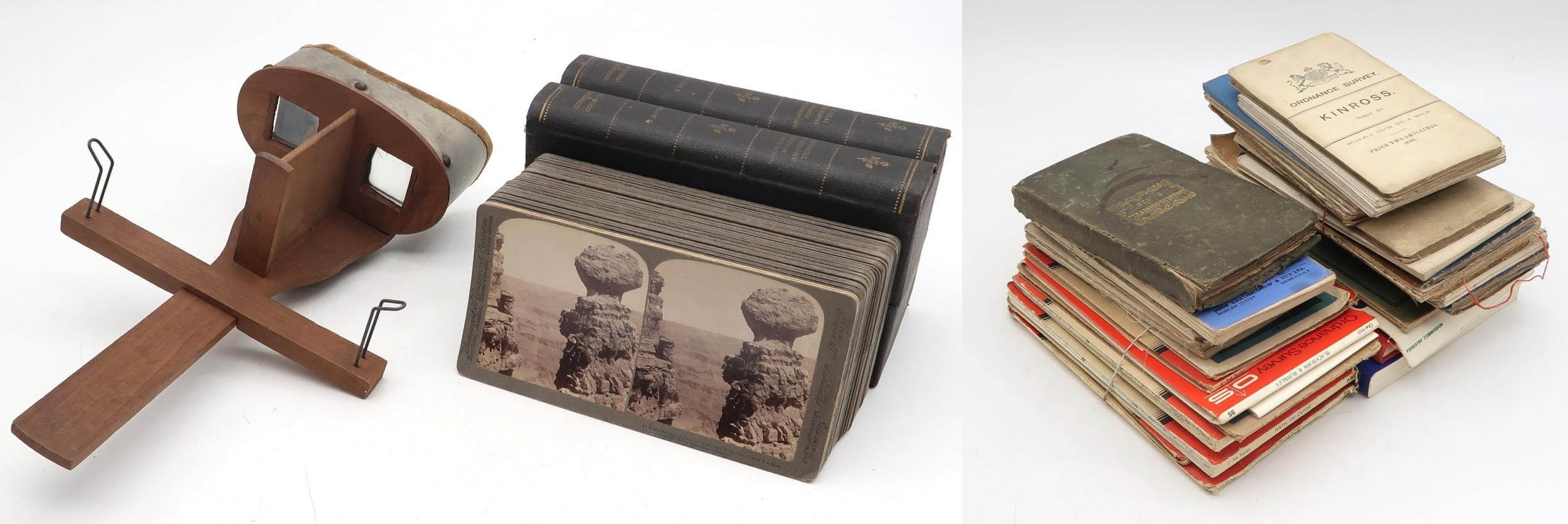 A stereoscopic slide viewer, with a cased set of views titled Physical Geography Through the