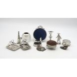 A collection of silver including a silver glass globular match striker, Birmingham, a pair of silver