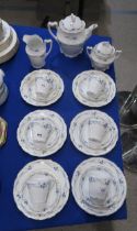 A KPM Art Nouveau porcelain tea set comprising teapot, milk jug, sugar bowl and six trios