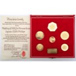 COMMEMORATIVE a rare 22 CT gold cased set of six minted for the occasion of the wedding of HRH