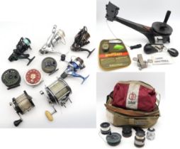A collection of fishing reels, to include Penn 4/0 Senator, Daiwa Lochmor-S 300 and Mitchell