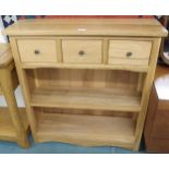 A contemporary beech JB Global open bookcase with three drawers over two open shelves, 95cm high x