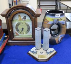A Goebel Dali glass vase, a Danbury Mint Staffordshire Bull Terrier clock and a Twin Towers
