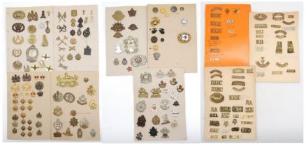 An album of military cap and other badges, to include the Gloucestershire Regiment, Mine Clearance