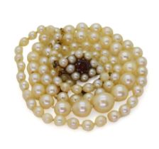 A string of Ciro cultured pearls with a 9ct gold garnet and pearl clasp, length 46cm, weight 12gms