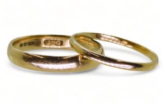 Two 18ct gold wedding rings, sizes, S1/2 (wider) and R, weight together 5.2gms Condition Report: