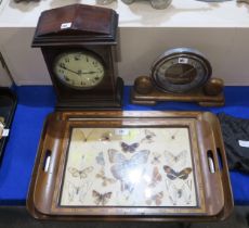 Two wooden mantle clocks and two butterfly wing trays Condition Report:Available upon request