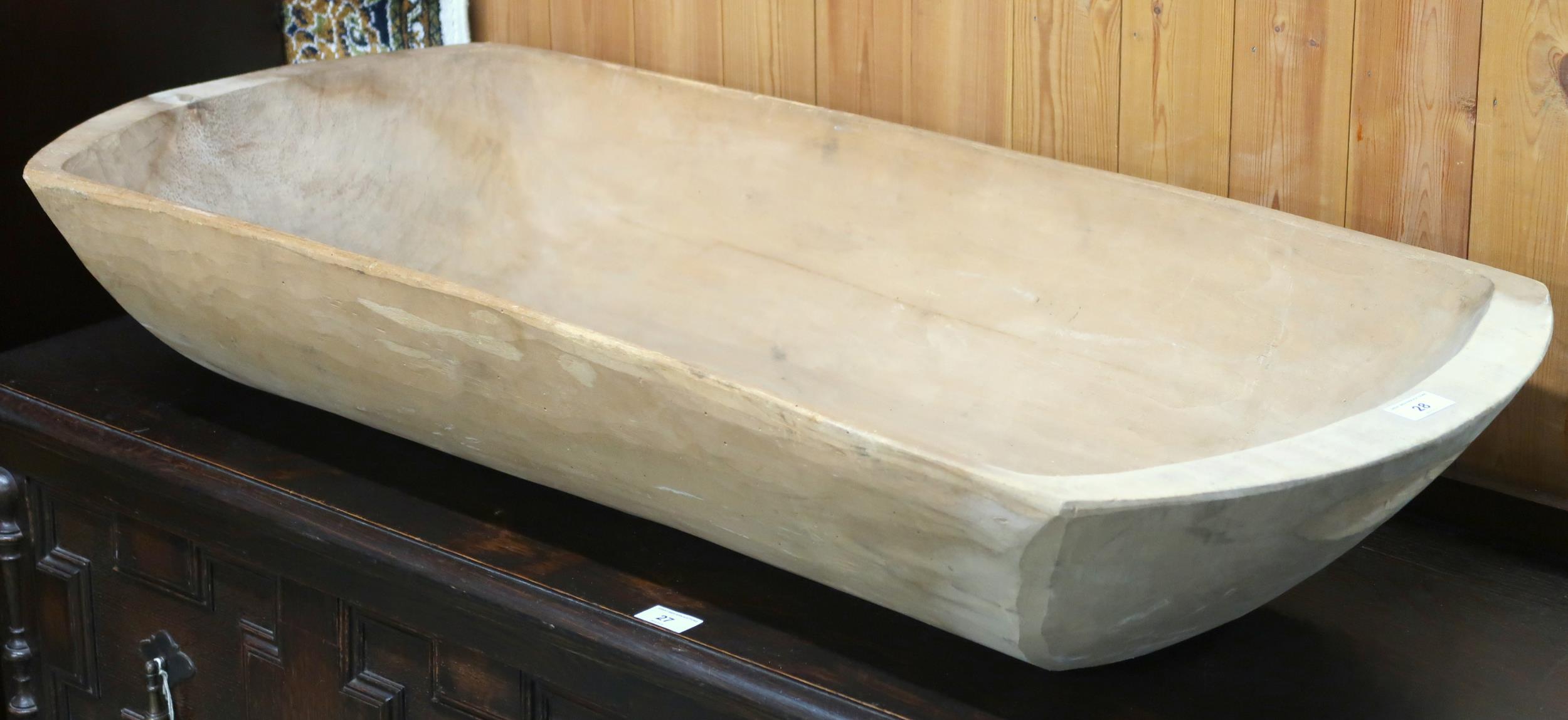 A 19th century shaped pine dough bin, 18cm high x 109cm wide x 45cm deep Condition Report: