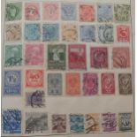 Postage Stamps of the World in a Strand Album with early Great Britain, Hong Kong, France, United