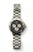 A gents Tag Heuer Indianapolis 500 miles, the back of the case stamped CAU1113, RAZ2400, the