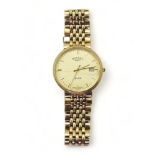 A 9ct gold gents Rotary Elite watch and strap, weight all together 56.6gms Condition Report:Has a