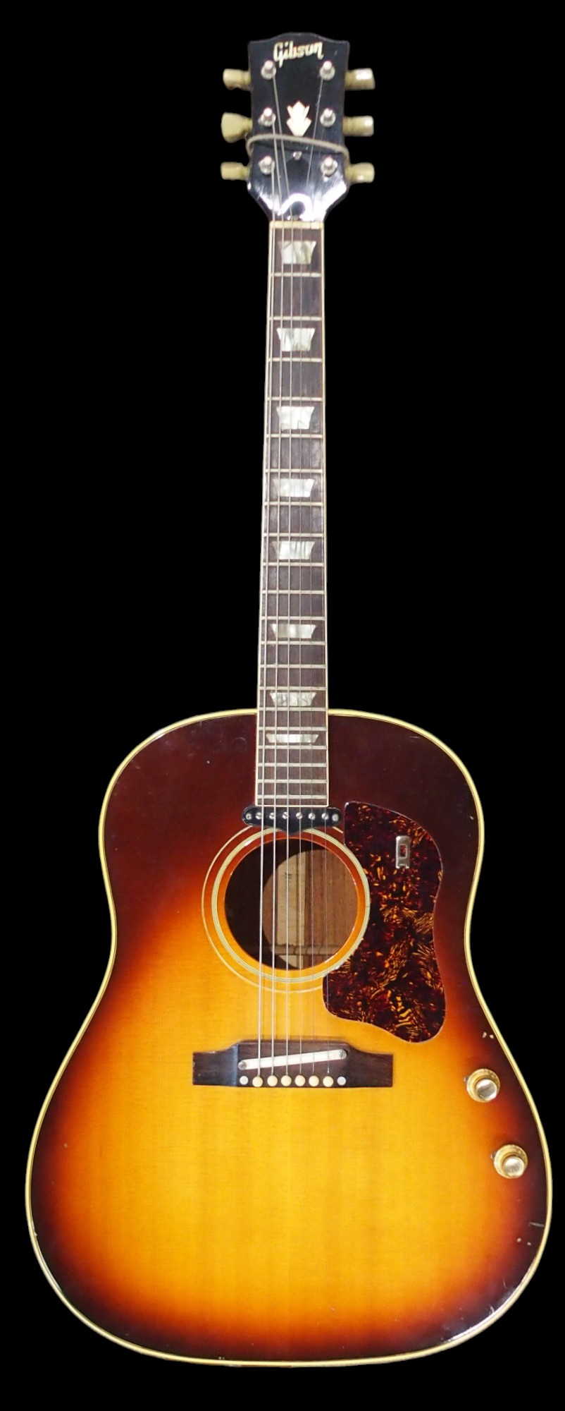 GIBSON a Gibson J160E electro acoustic guitar in dark sunburst serial number 890922 circa 1969