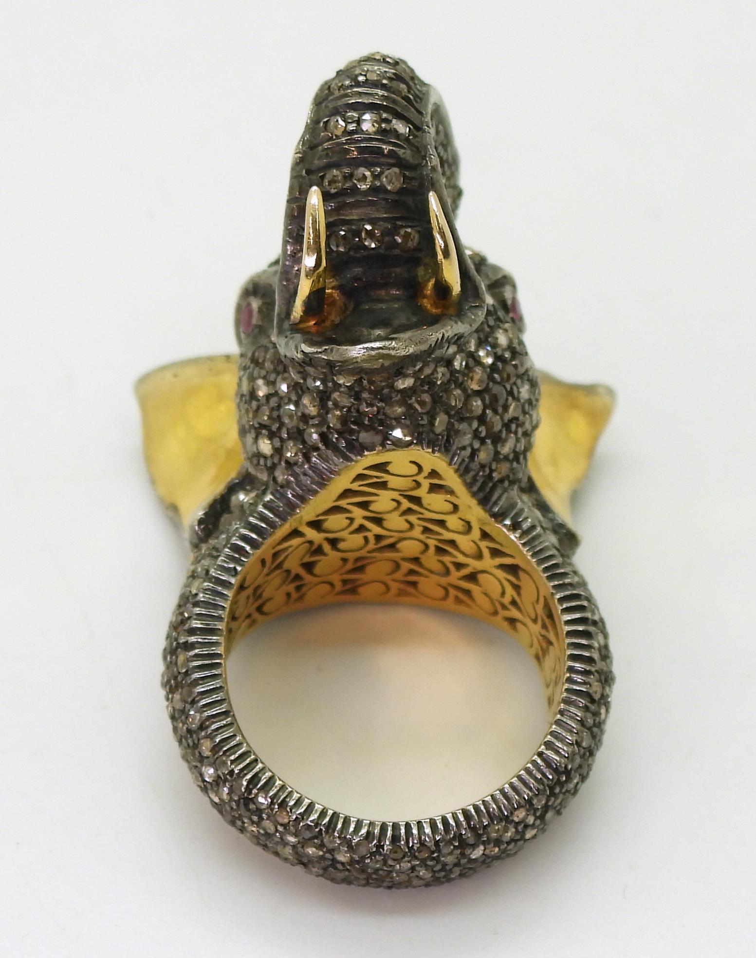 A yellow and white metal elephant statement ring, entirely set with rose cut diamonds, with a - Image 4 of 4