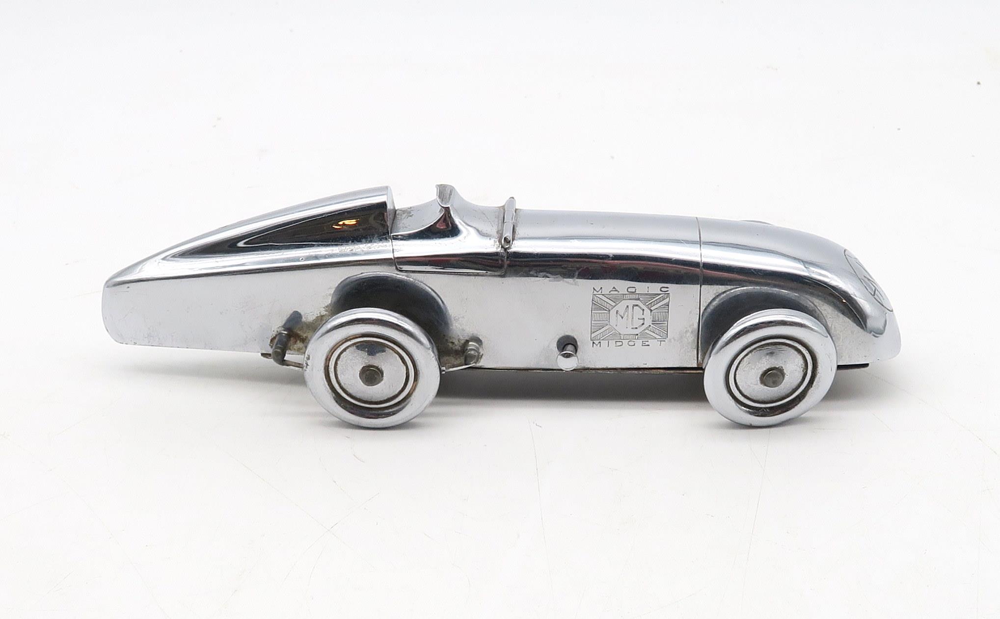 A chrome-plated Art Deco MG "Magic Midget" table lighter, marked to the underside "S&M, Made in - Image 2 of 5