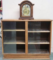 A lot to include an early to mid 20th century oak bookcase with glass sliding doors, 80cm high x