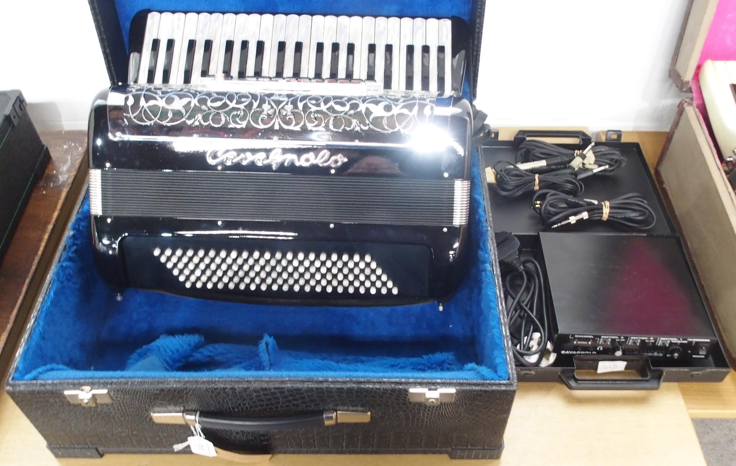 A Cavognolo Odysee reedless 120 bass 41 key piano accordion serial number 45602 together with a