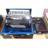 A Cavognolo Odysee reedless 120 bass 41 key piano accordion serial number 45602 together with a