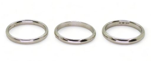 Three platinum wedding bands, Size two are L1/2, one L, weight together 10.8gms Condition Report: