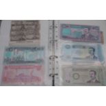 A collection of worldwide banknotes with examples from North Korea, Iraq, Syria, The Islamic