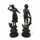 A pair of spelter figures of fisherfolk Condition Report:Available upon request