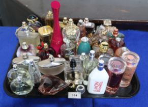 A collection of perfumes, including Cerruti, Tommy Hilfiger, Karl Largerfeld, Givenchy, Dior etc