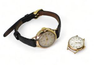 A 9ct cased ladies Tudor watch with black leather strap, number stamped to the mechanism 2325,