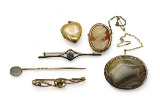 A collection of 9ct gold and yellow metal brooches, to include an Art Nouveau brooch set with a
