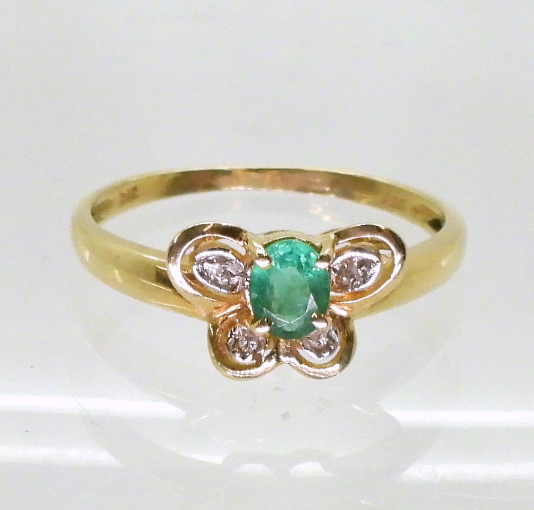 A 14k gold emerald and diamond accent butterfly shaped ring, P, weight 1.9gms Condition Report: - Image 2 of 3