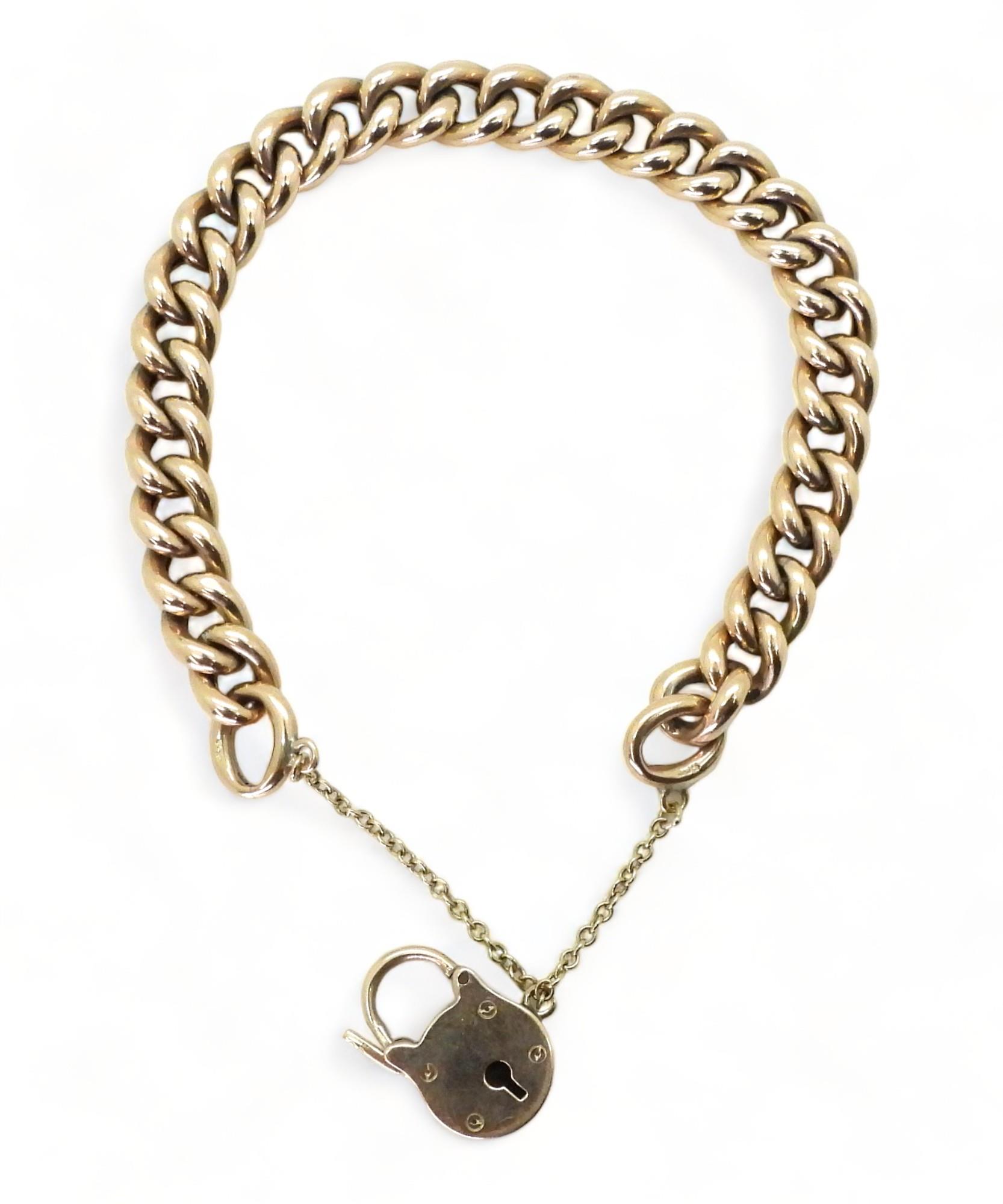 A 9ct gold curb link bracelet, with a padlock clasp, length 19.5cm, weight 19.6gms Condition