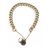 A 9ct gold curb link bracelet, with a padlock clasp, length 19.5cm, weight 19.6gms Condition