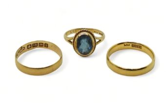 An 18ct gold 1920 Glasgow hallmarked wedding ring, size N, together with a further 18ct wedding