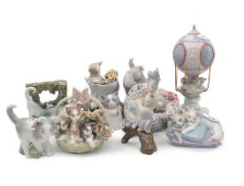 A collection of Lladro figures of cats and kittens including cats in a hot air balloon Condition