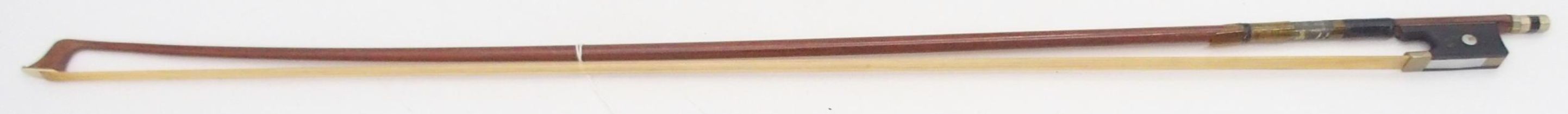 A violin bow 71 grams with inscribed maker's mark SAXONIA Condition Report:Available upon request